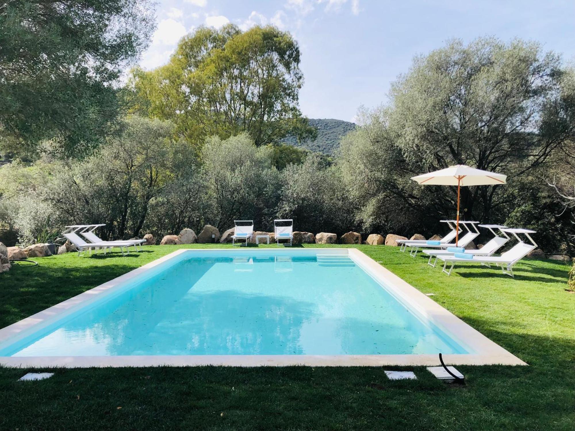 Stazzo San Teodoro Il Ginepro Piscina Condivisa Apartment Luaran gambar
